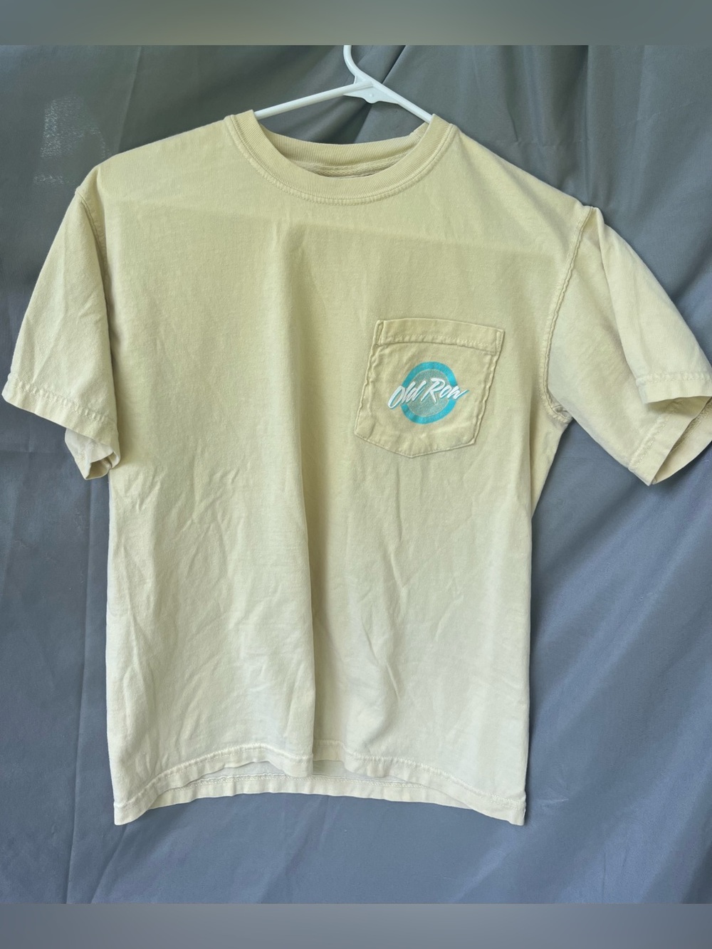 Comfort Colors Pale Yellow Short-Sleeve Pocket Tee with Aqua Logo